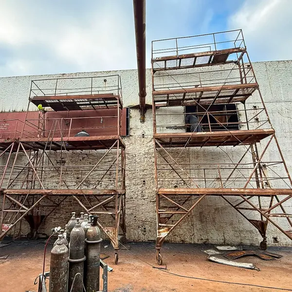 Hull repair works carried out from staging during dry dock support