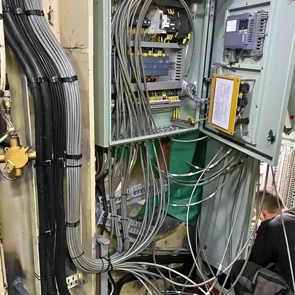 Onboard ship electrical cabinet with cable wiring and terminal connections