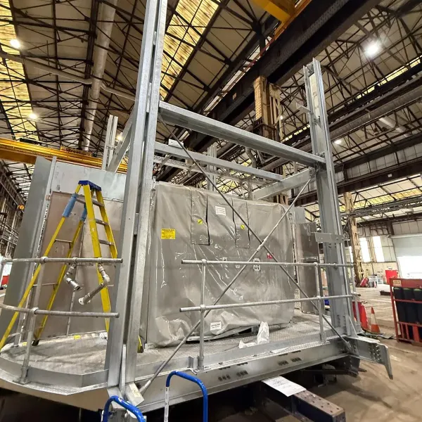 Galvanized industrial steel equipment support frame with base platform and structural bracing