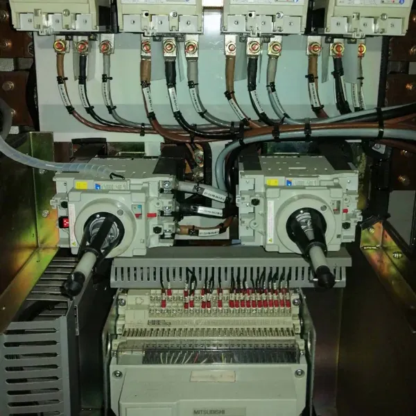 Main disconnect switches and control wiring inside an electrical panel