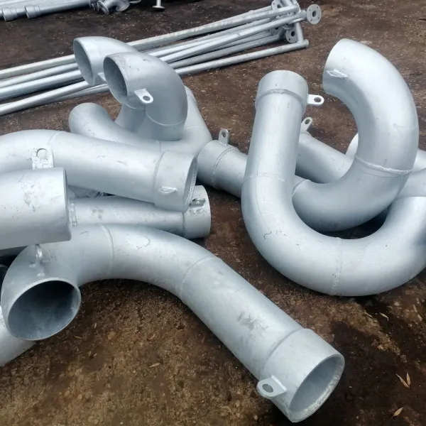 Coated marine pipe bends and prefabricated pipe spools prepared for onboard piping installation during ship repair.
