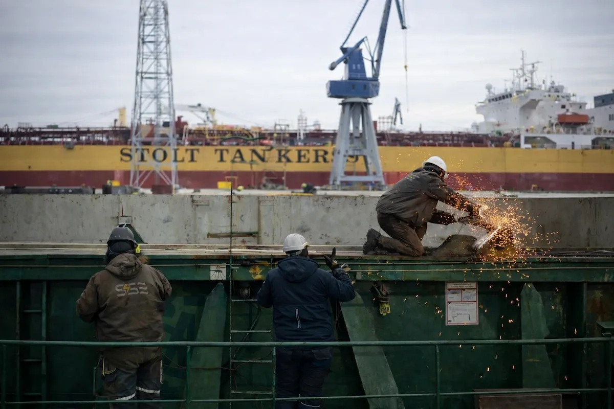 Ship hull welding repair in dry dock – SSE team performing steel work